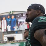 saskatchewan-roughrider-fans-pay-tribute-to-player-and-man-killed-in-crash