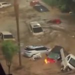 flash-floods-sweep-away-cars,-cut-roads-to-villages-in-northern-china