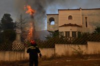 firefighters-still-battling-fires-in-greece-after-2-killed-in-helicopter-collision