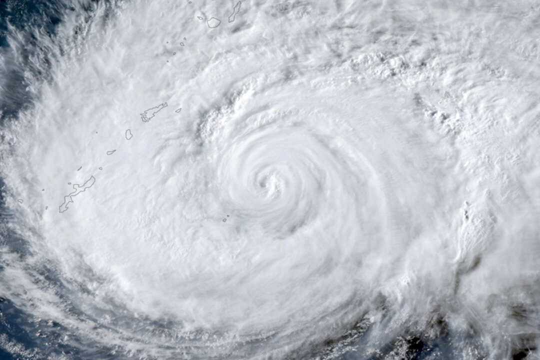 japan-orders-evacuations-as-typhoon-dolphin-approaches,-cancels-500-flights