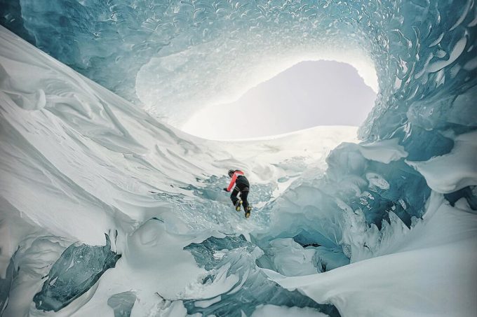 ‘another-world’:-photographer-explores-giant-ice-caves-in-the-belly-of-a-glacier—and-the-photos-are-surreal