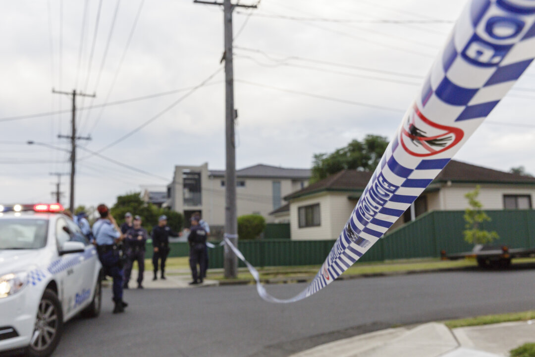 10-year-old-punched,-mother-allegedly-stabbed-with-scissors-outside-victoria-police-hq