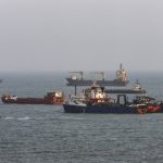 tanker-hit-in-strait-of-hormuz-as-iran,-oman-pursue-new-shipping-deal