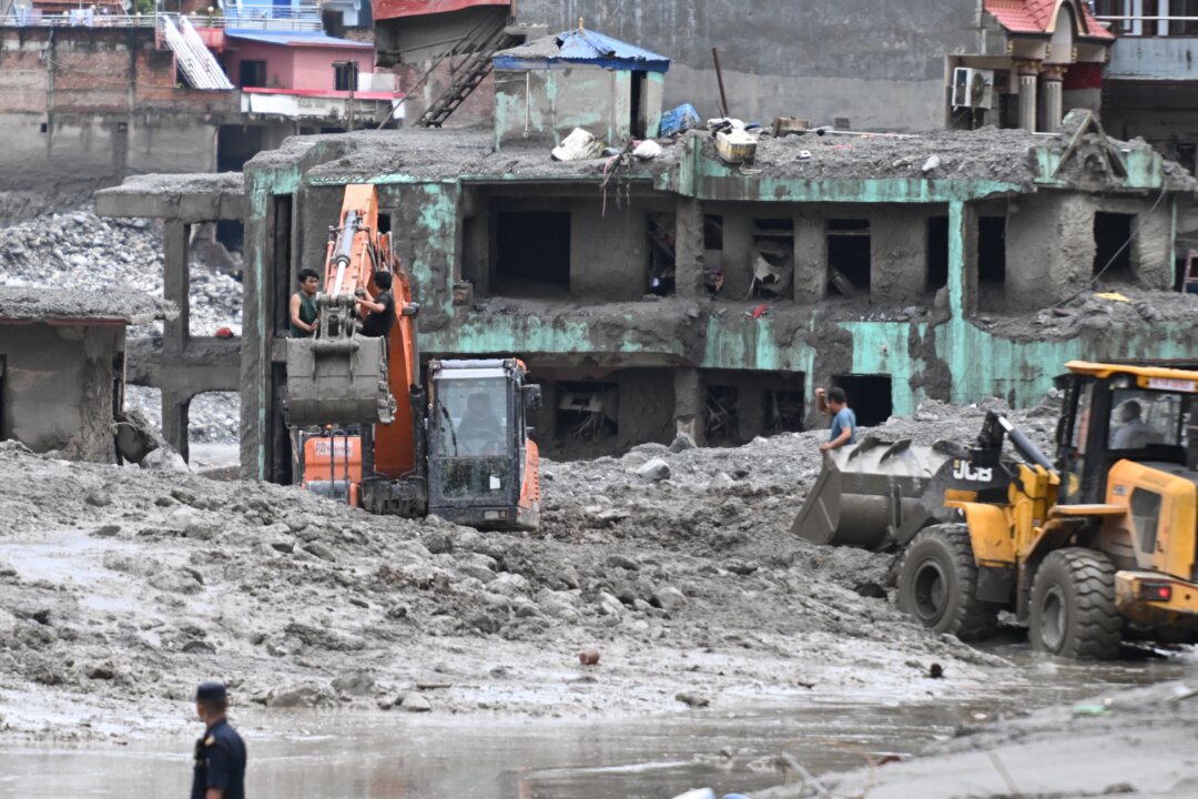 australia-pledges-another-$3-million-in-aid-as-nepal-tibet-flood-toll-mounts