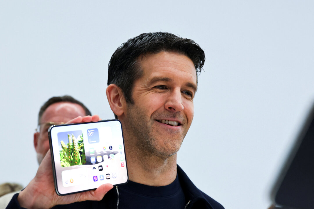 apple-joins-foldable-phone-race-with-$1,999-passport-shaped-iphone-duo